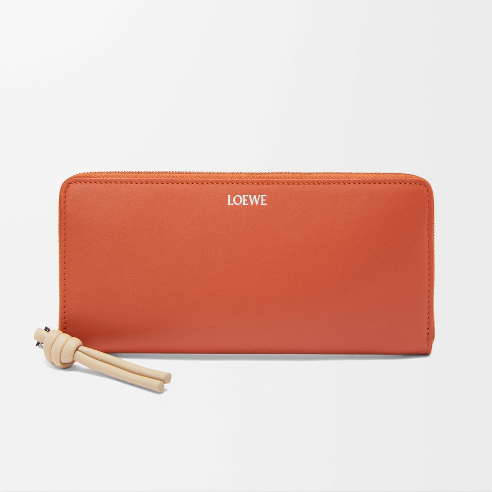 Loewe Knot zip around wallet in shiny nappa calfskin (Maple/Papercraft)