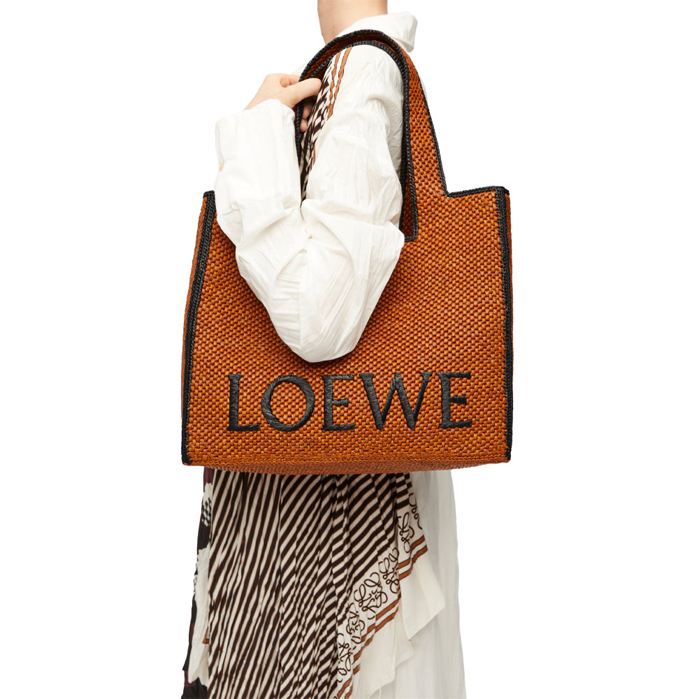 Loewe Large LOEWE Font tote in raffia (Honey Gold)